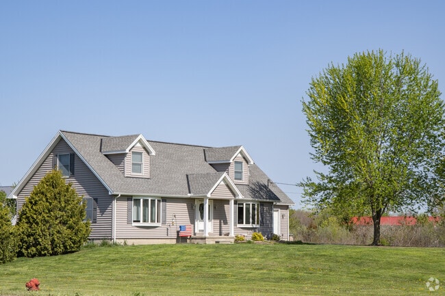 Cottage-style homes in Belleville blend with the area’s natural wildlife.
