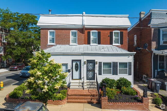 Some row homes in North Brandywine feature enclosed front porches.