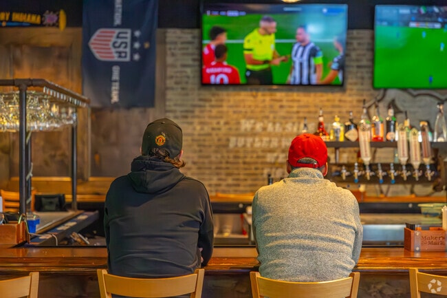Grab a drink with a friend in Butler-Tarkington at Chatham Tap and catch the game.