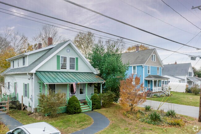 Cape Cod and Colonial-style homes are common in Ashaway, Rhode Island.