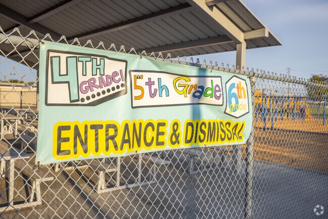 Older students enter and exit Demille Elementary from designated areas in Westminster, CA.