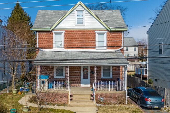 Escape the summer heat underneath your covered front porch on colonial revivals in Drexel Hill.