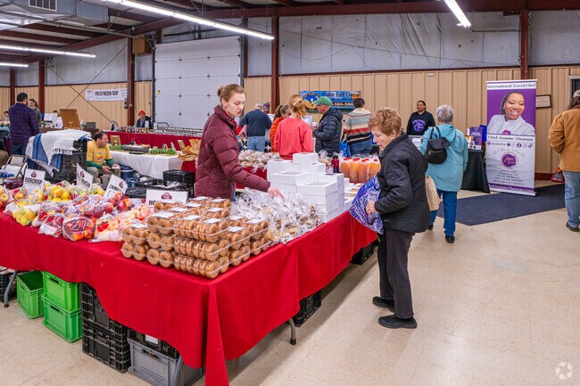 Baked goods entice visitors at the Indoor Woodstock Farmers Market in Woodstock.