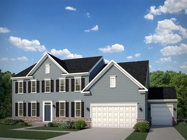 The Carson Federal Elevation with Opt. Stone Water Table and Opt. 3 Car Side Load Garage