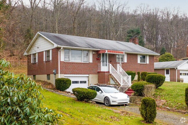 Some homes have the Lower Yoder trees as a backdrop.