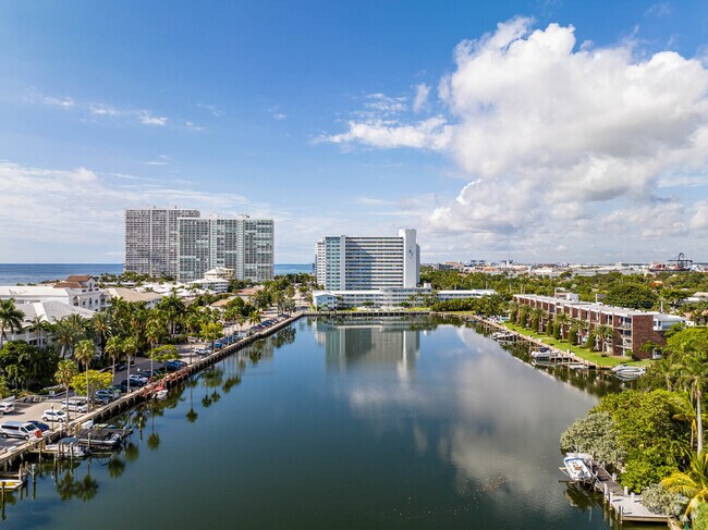 The Harbour Isles neighborhood is surrounded by clear blue water, lush greenery, and quiet streets.
