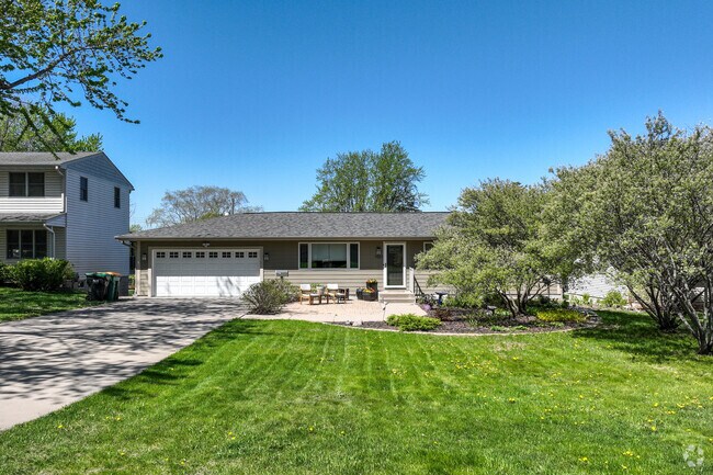 Some ranch style homes in Brownwood feature a small front patio.