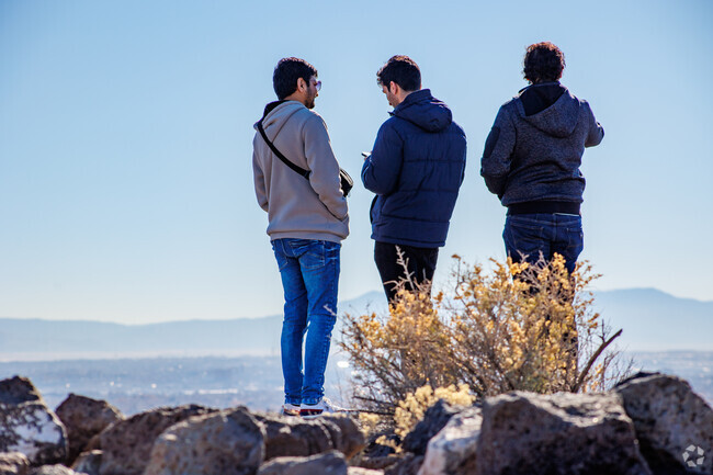 Ladera West residents enjoy the sights atop the Boca Negra Canyon trail.
