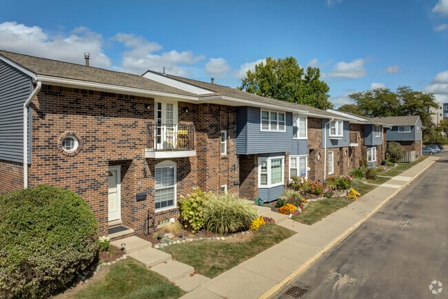 More classical condo options in Georgetown feature brick-faced buildings with outdoor patios.