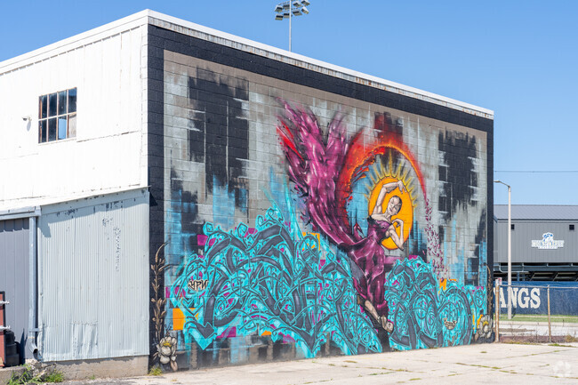 You'll find beautifully done wall murals when living in the Wellington Heights area.