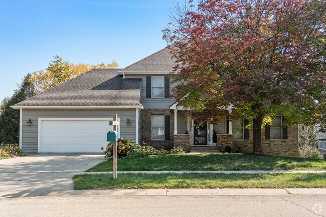 Brick-accented Colonial homes in Foxcroft offer timeless appeal in a peaceful suburban setting.