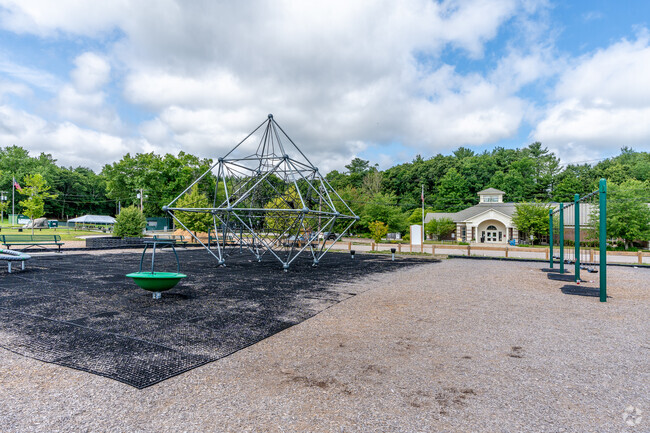 Charles E Roderick Elementary School's Playground features a swing and jungle gym.