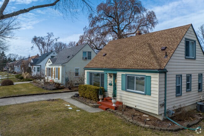 Rows of homes in Clawson have tidy front yards.