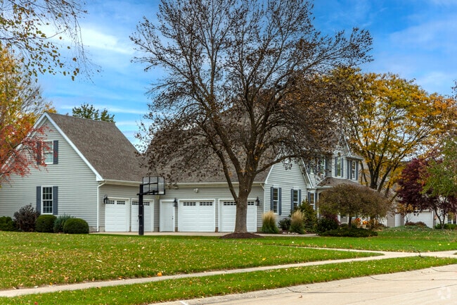 A prairie style home with attached garage in Stoney Creek.