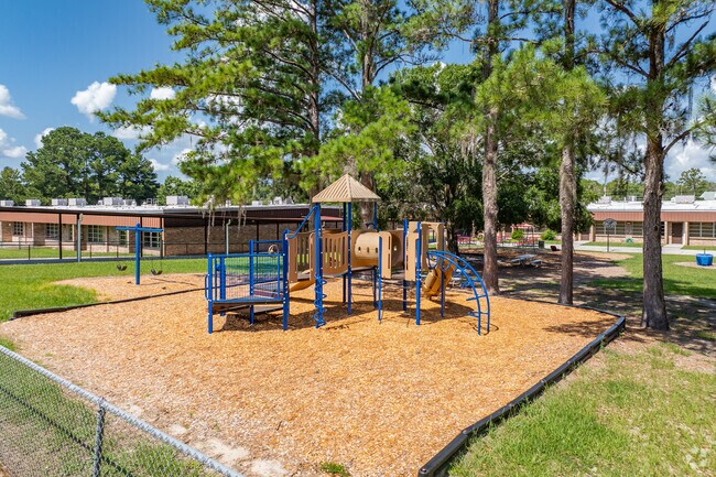 Kids enjoy playing on the play area at Pleasant Grove Elementary School.