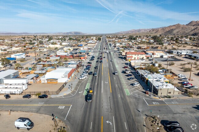 An aerial view looking east over the retail shopping area along 29 Palms Hwy in Joshua Tree.