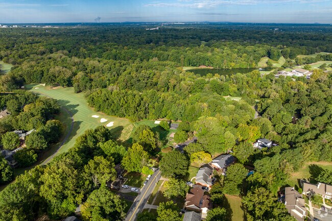 The Raintree neighborhood is 12 miles south of bustling Uptown Charlotte.