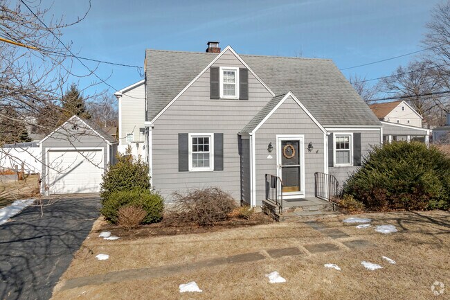 A modified Cape Cod style home brings a sense of wonder to this University street.