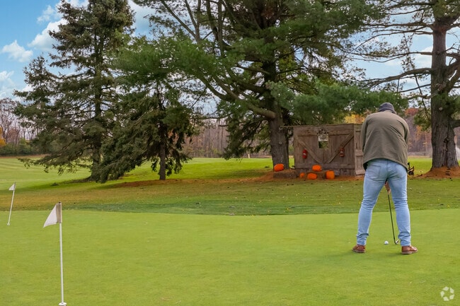 Warm up at the driving range or putting green at Rolling Meadows in Northfield Township.