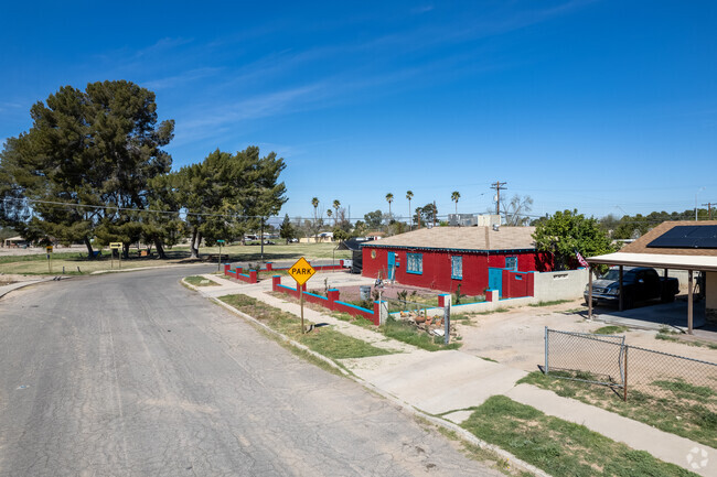 A bright red home in Julia Keen stands out.