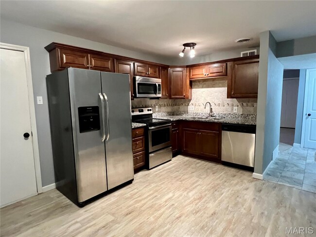 6990 Colonial Woods Dr unit 59, Saint Louis, MO 63129 - photo 2