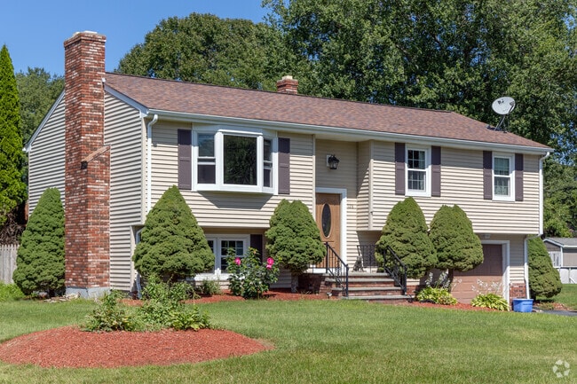 A nice bi-level home in the Luther Corner neighborhood has a recessed entry sheltering friends.