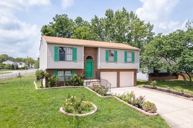 A two-story, Contemporary home in Holly Hill with an attached garage.
