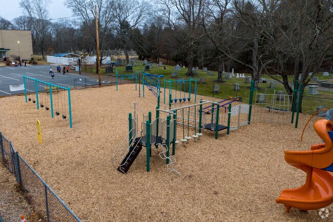 This playground is at the Our lady of the valley regional school in Uxbridge, MA.