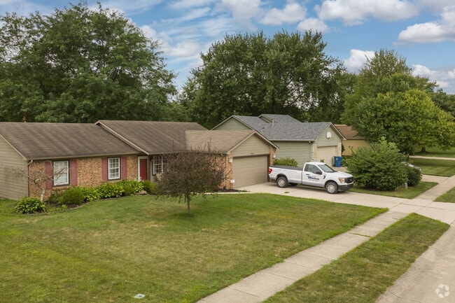 An example of more modest homes with brick ranch homes mixed in around Geist.