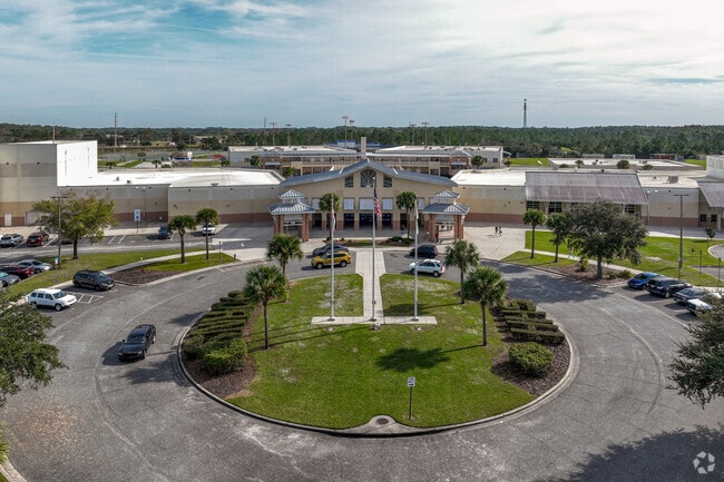 Harmony High School front entrance and roundabout in Harmony neighborhood.
