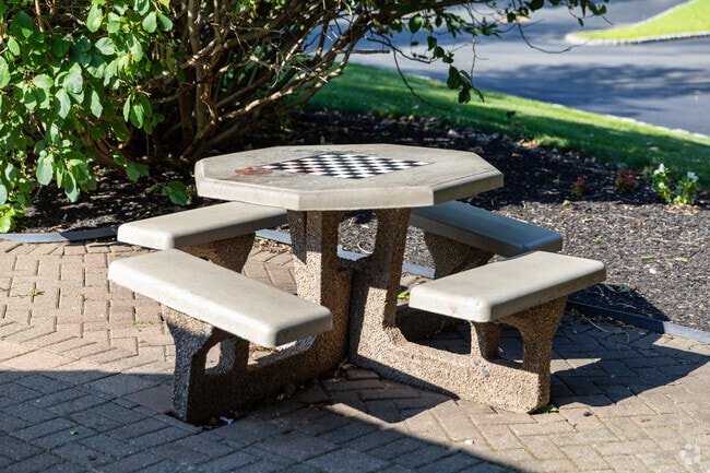 Take a seat and play a game of chess at Chestnut Ridge Garden.