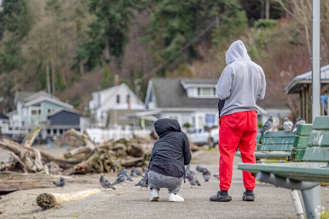 Couple out at Dash Point Park & Pier taking photos.