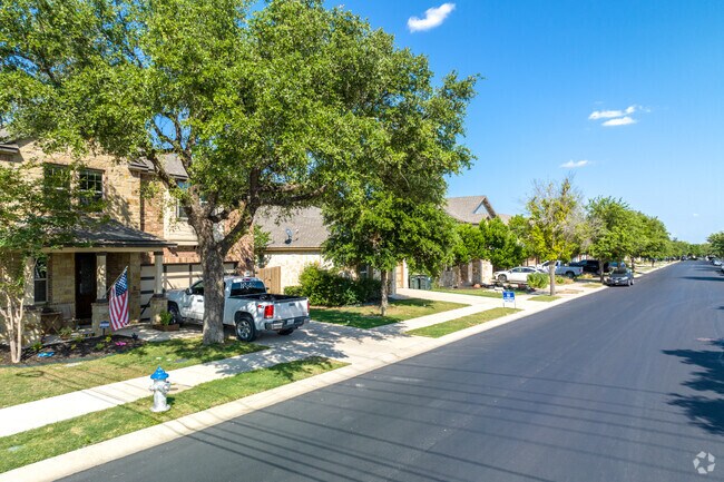 Quiet suburban streets are lined with neat sidewalks in Georgetown Village.