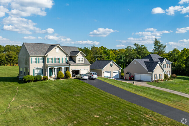 A charming row of newly constructed colonial style homes in Tilghmanton.