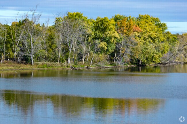 Fall colors peek through along the charming Fox River in Southwest St. Charles, IL.