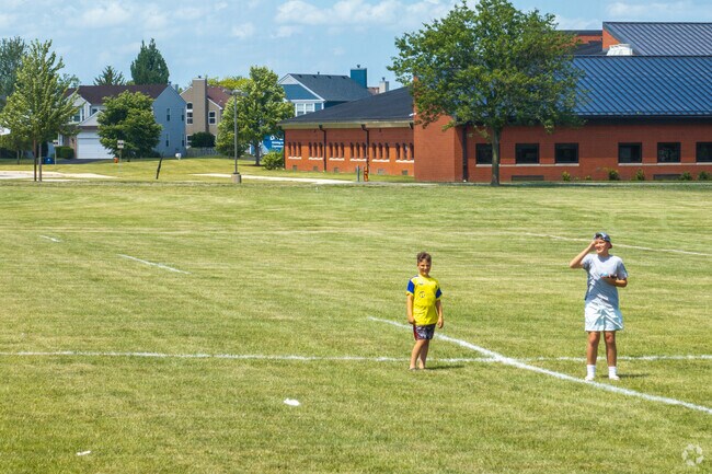 Harris Fawell Park features expansive grassy fields ideal for soccer games and outdoor recreation.