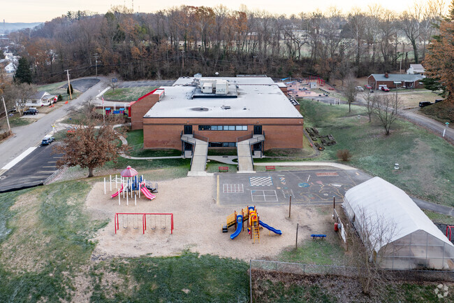 The children at Spring Hill Elementary School love playing on the playground during recess.