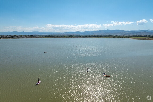 Come paddle board with friends on McIntosh Lake.