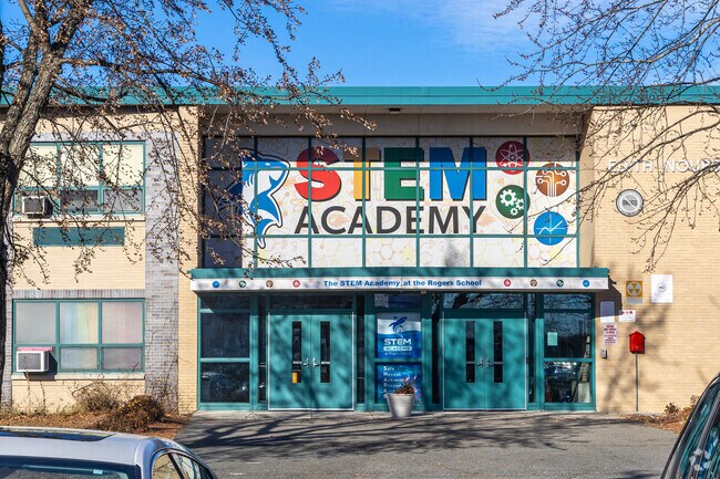 Rogers STEM Academy in Lowell, MA, has a vibrant entrance welcoming students.