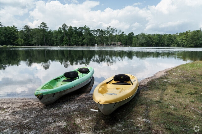 Kayaks sit waiting to be taken out onto Lake Nummy at Belleplain State Forest