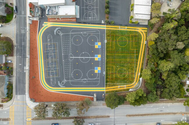 Abbott Middle School has a large blacktop and an open grass field for PE and school breaks.