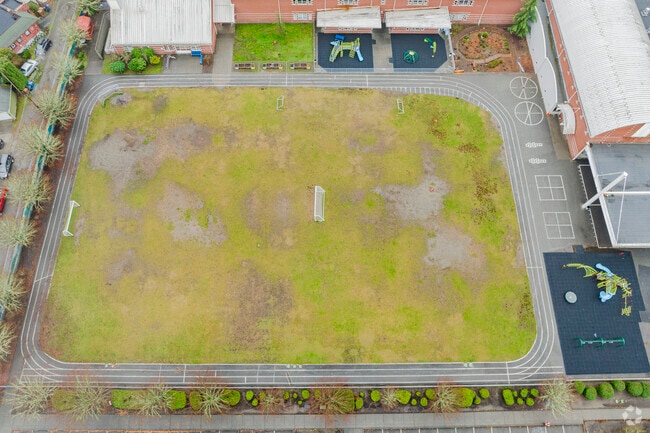 Soccer field and playground area for Sherman Elementary School.