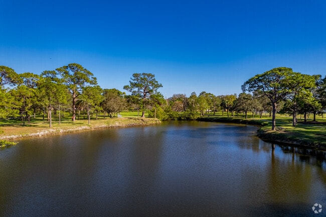 Take in the views of the pond at Fossil Park in the Fossil Park neighborhood.