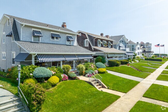 Rows of large homes with perfect lawns adorn the streets of Sea Girt.