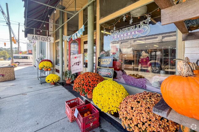 Storefronts in Four Oaks are lined with seasonal colors and decor throughout the year in Ingrams