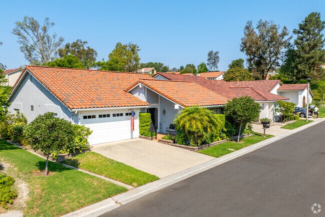 A row of mediterranean homes that are similar in design in the Casta del Sol community.