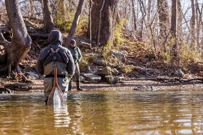 Fly Fisherman flock to Lake Taneycomo for year round trout fishing.
