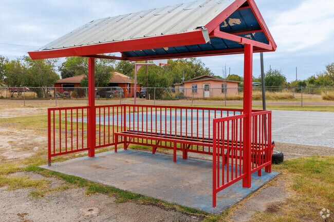 You'll find many covered school bus stops in Eidson Road.