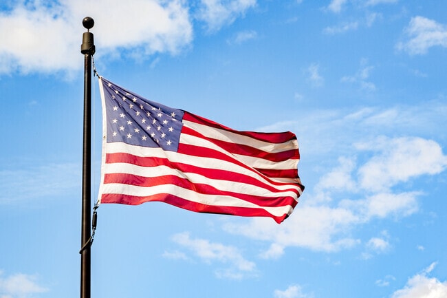 The American flag stands proudly over Honeysuckle Hills.