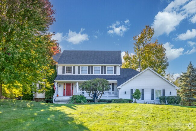 Two story white farmhouse-style homes are a part of the housing stock in Bull Valley.